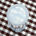 Contenedor de comida plástico redondo claro con tapa